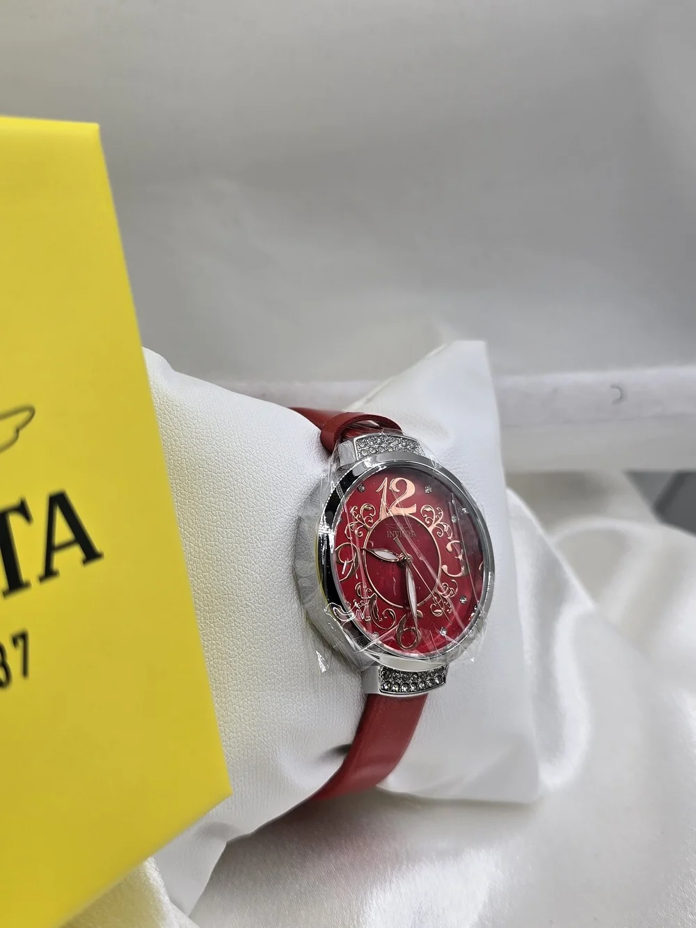 Invicta Celestial Women’s Quartz 33mm Silver Case White Dial Red Band